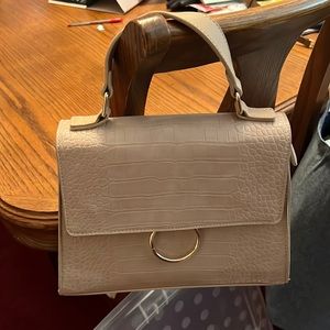 Top handle bag or crossbody.